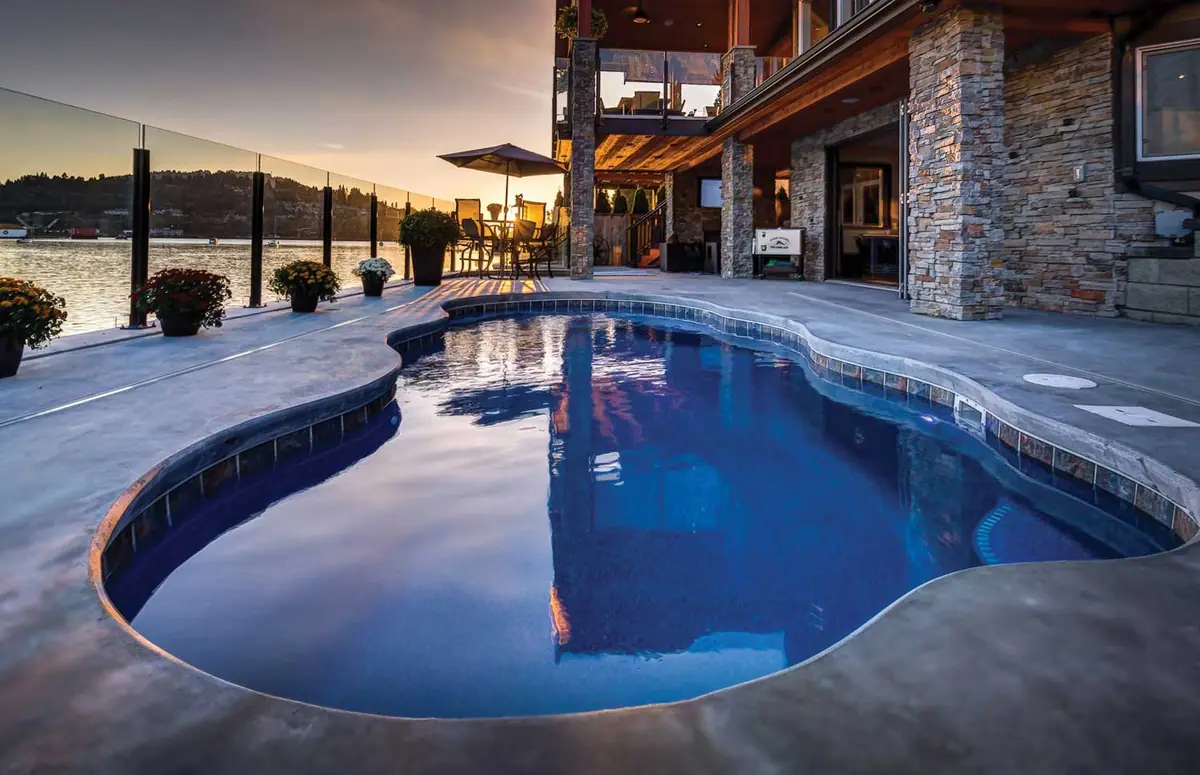 Aruba freeform fiberglass pool installation, view 1