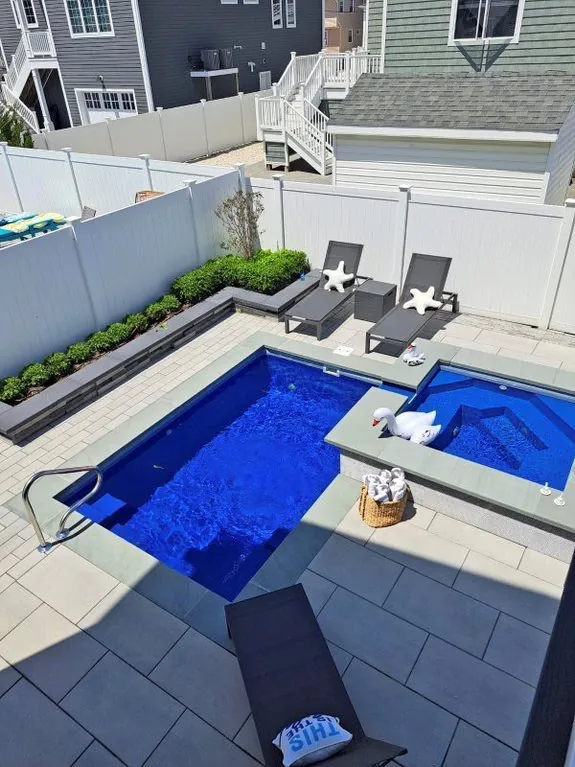 Pool in a private, fenced backyard